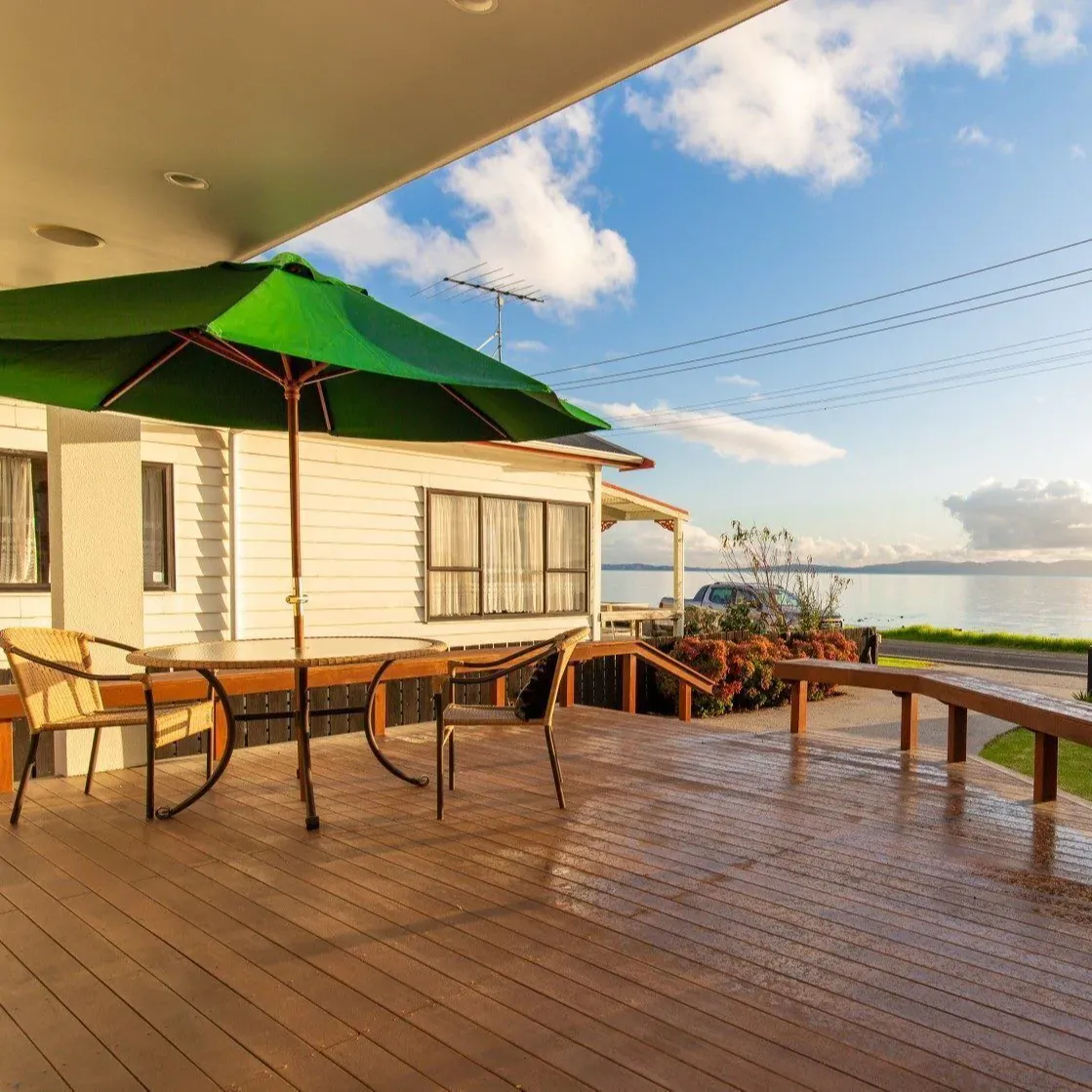 Sunset over the beach at a family home